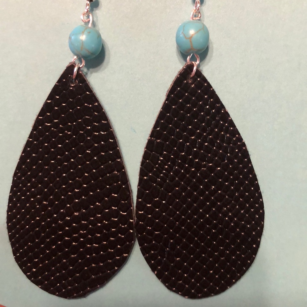 Beaded leather earrings.
